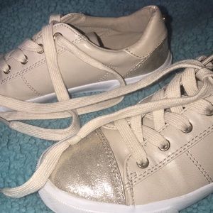 gold and tan casual shoes